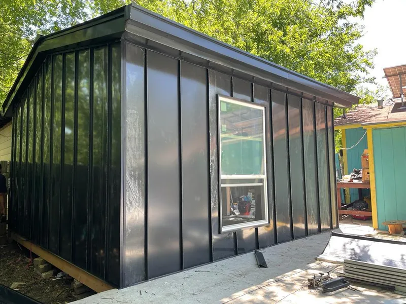 Black standing seam metal wall panels for Metal Roof Installation in Fresno