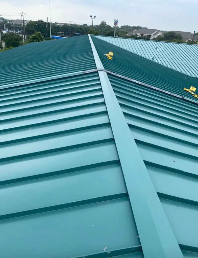 Green commercial metal roof ridge and valley for Metal Roof Repair in Fresno